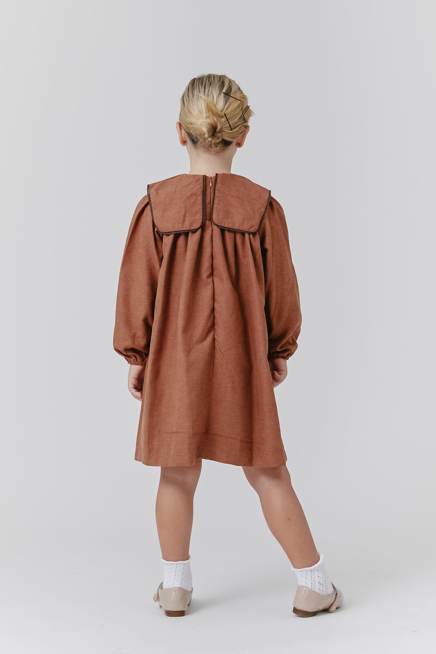 
                  
                    Bib Dress
                  
                