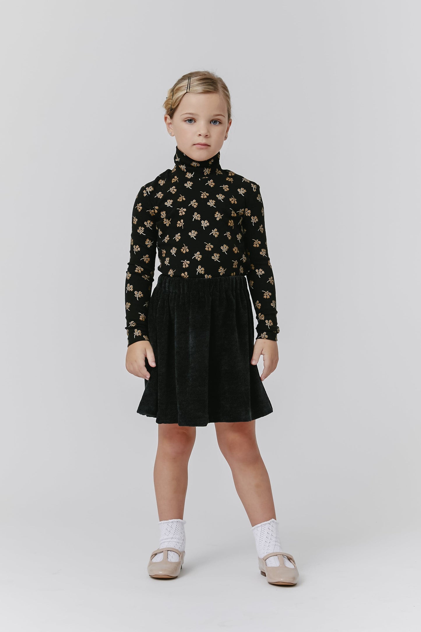 
                  
                    Floral Turtleneck - Black
                  
                