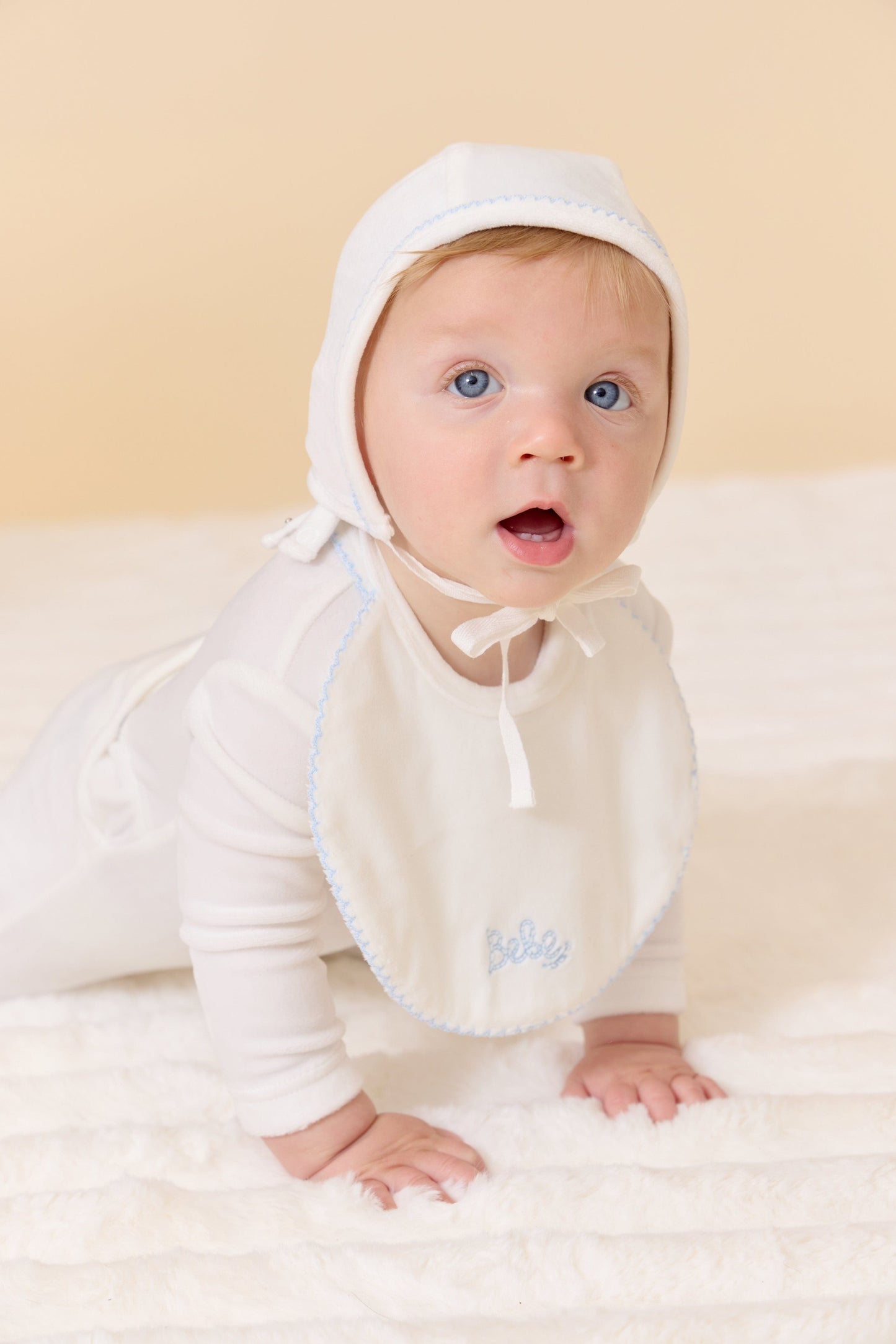 
                  
                    KIPP Bebe Bib - White Blue
                  
                