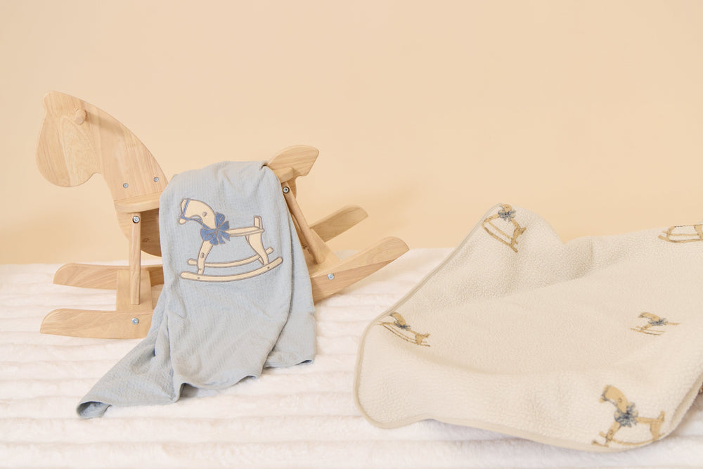 
                  
                    Rocking Horse Pattern Blanket - Blue
                  
                